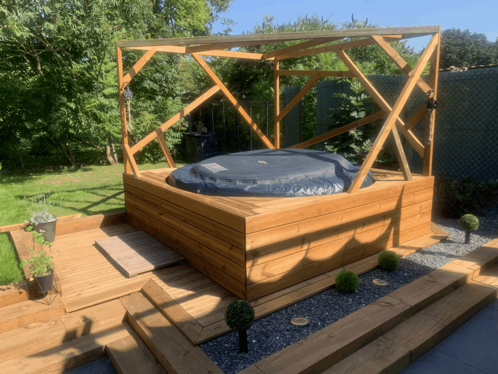 Terrasse spa Champenoux dalles plots traverses paysagères MAN OF STYLE habillage structure bien-être
